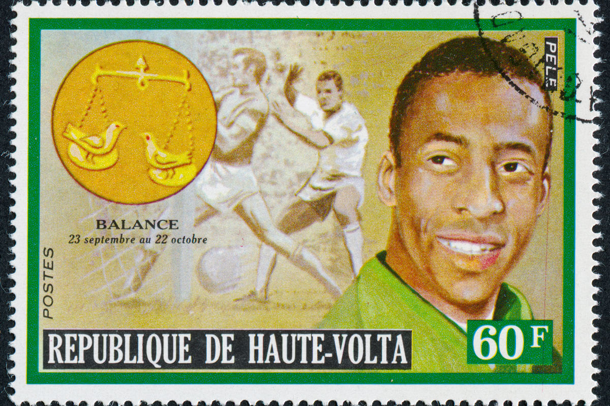 a postage stamp featuring the soccer legend, Pele