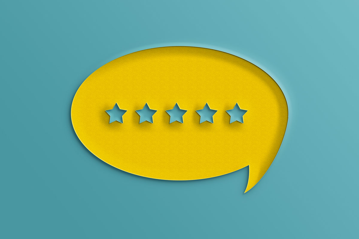 a speech bubble with 5 stars in it