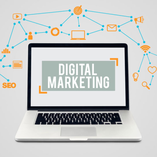 a graphic depicting a laptop with the words 'digital marketing' on the screen