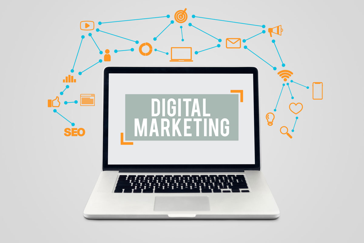 a graphic depicting a laptop with the words 'digital marketing' on the screen