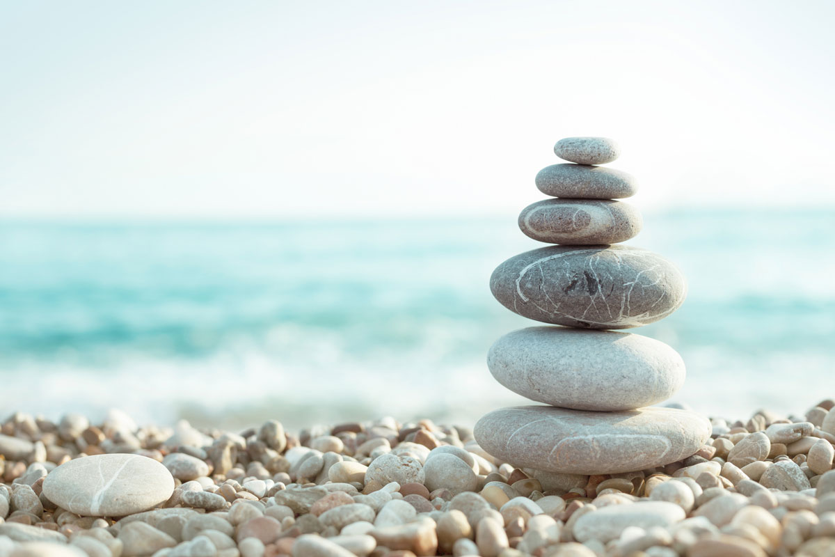 a pile of circular stones that symbolize a foundation