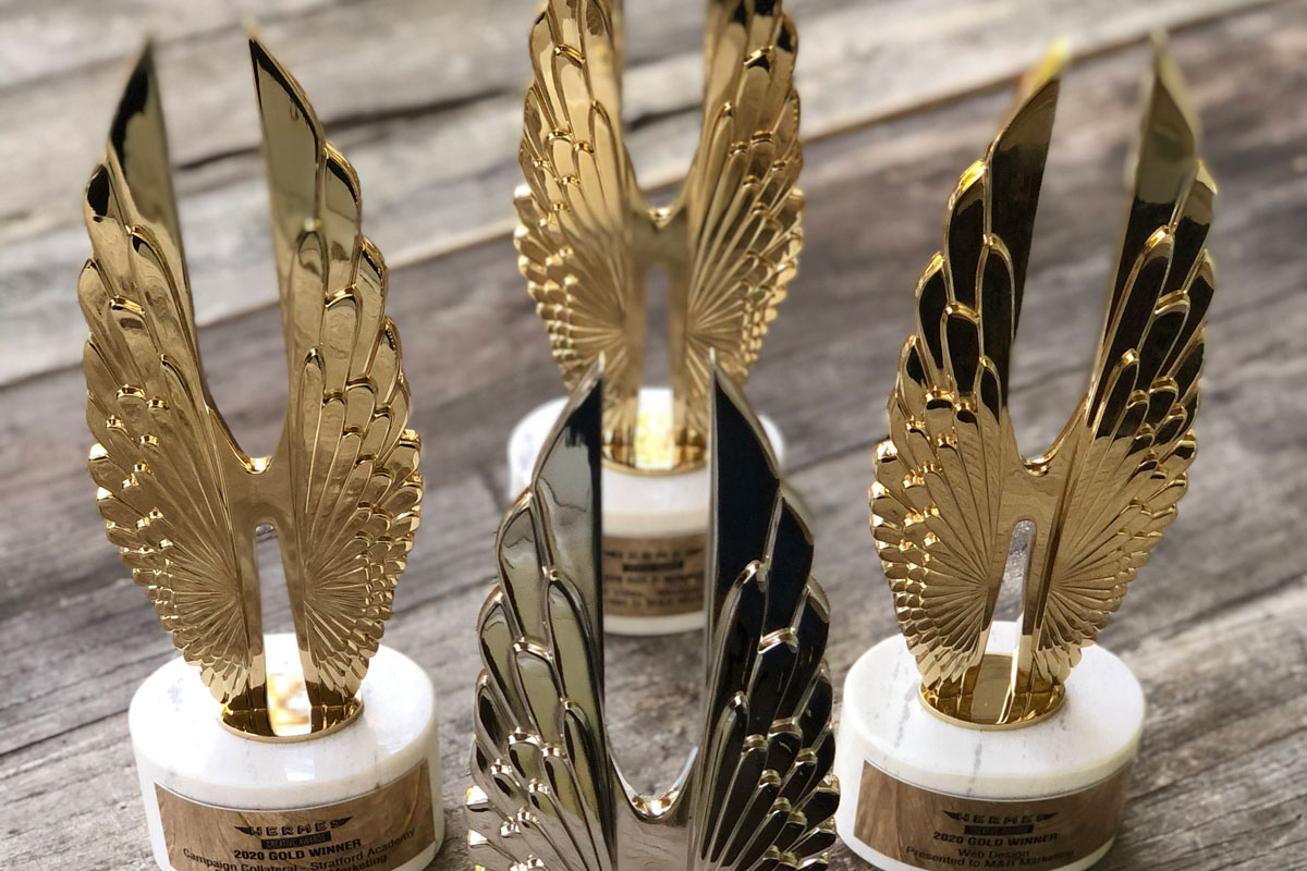 closeup shot of 4 Hermes awards M&R Marketing won