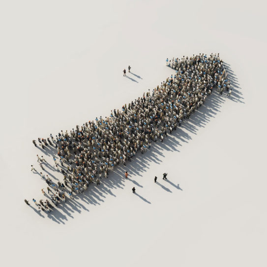 a large group of people standing in the formation of an upward pointing arrow