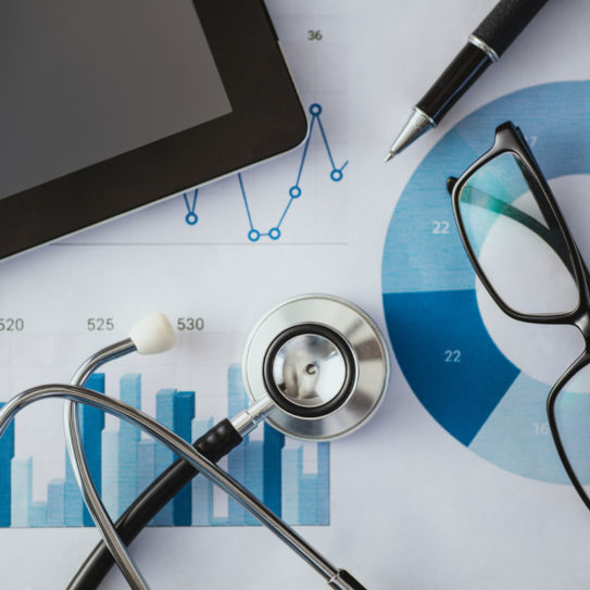 stethoscope, tablet, pen, and glasses