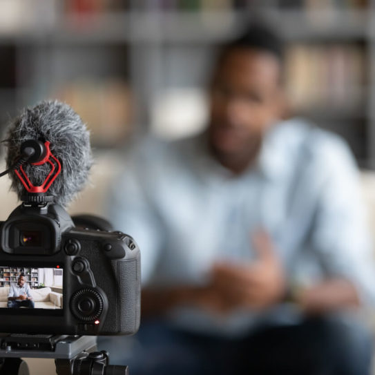 A man recording himself.