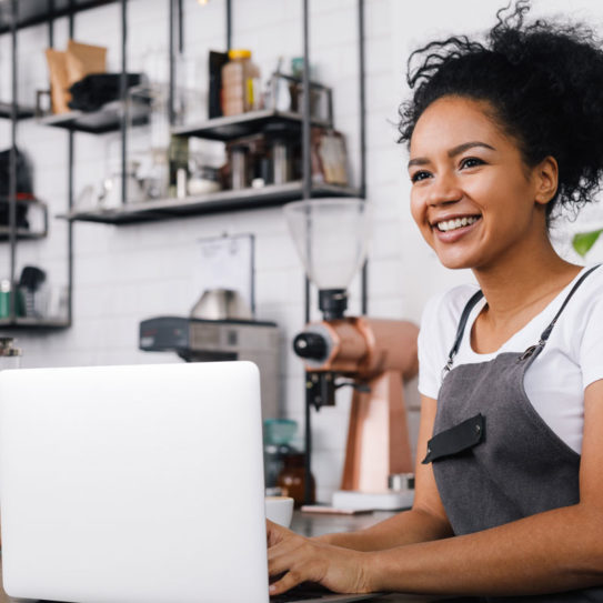 female business owner with laptop