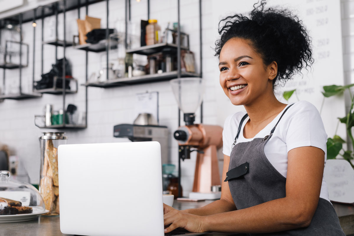 female business owner with laptop
