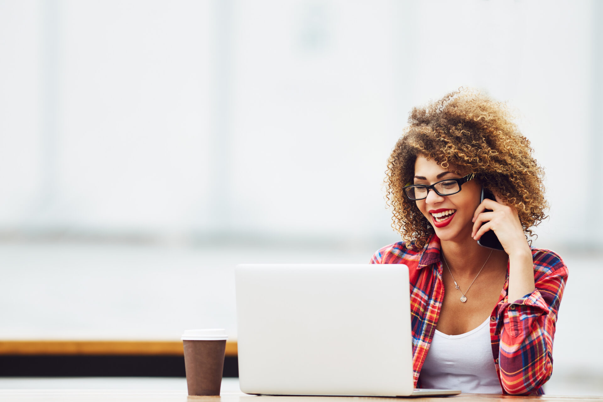 woman using computer hapilly