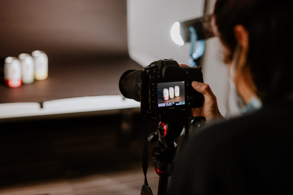 M&R Team member taking pictures of a client's products.