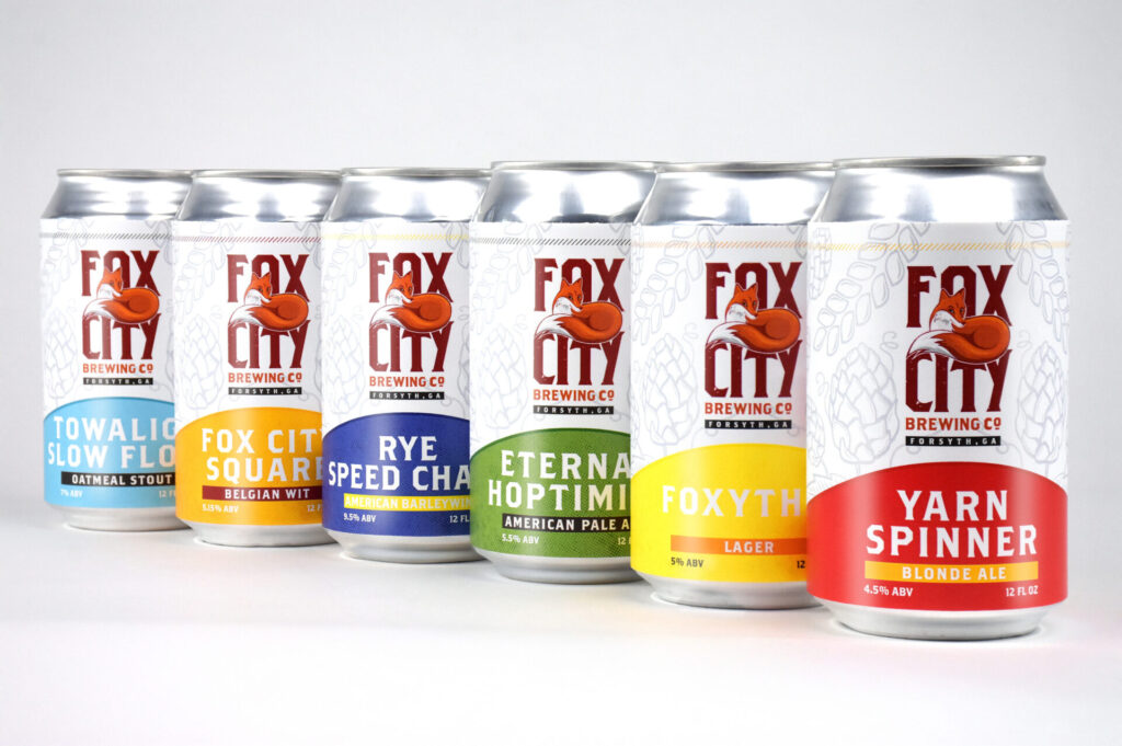 Product photography of a selection of Fox City Brewing beer cans