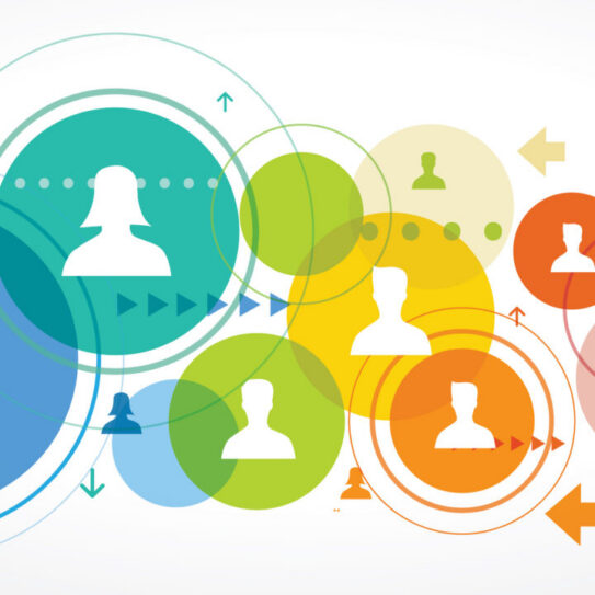 Colorful overlapping circles with white person silhouettes inside, joined by lines and arrows, symbolizing a social network on white background.